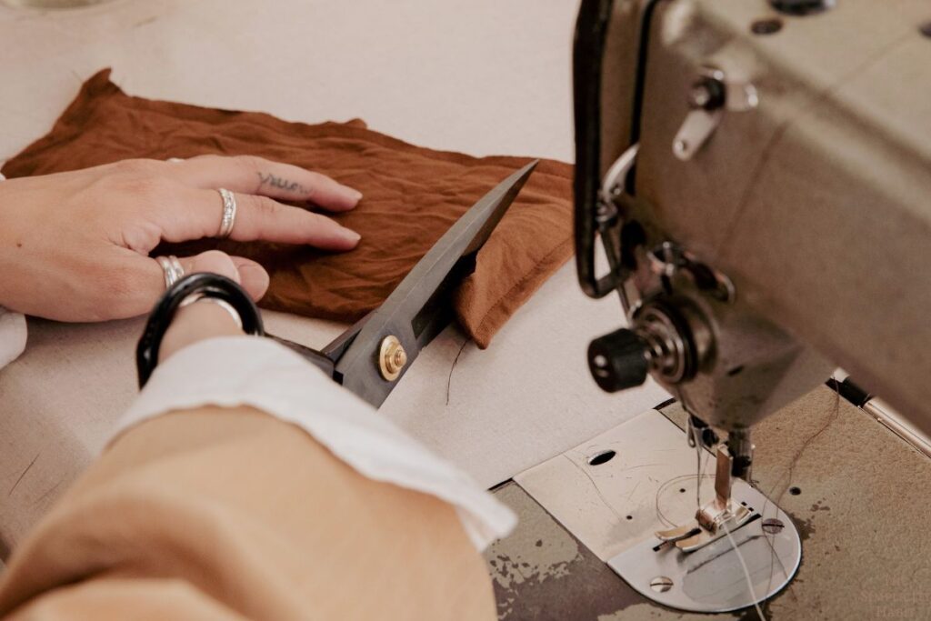woman cutting fabric