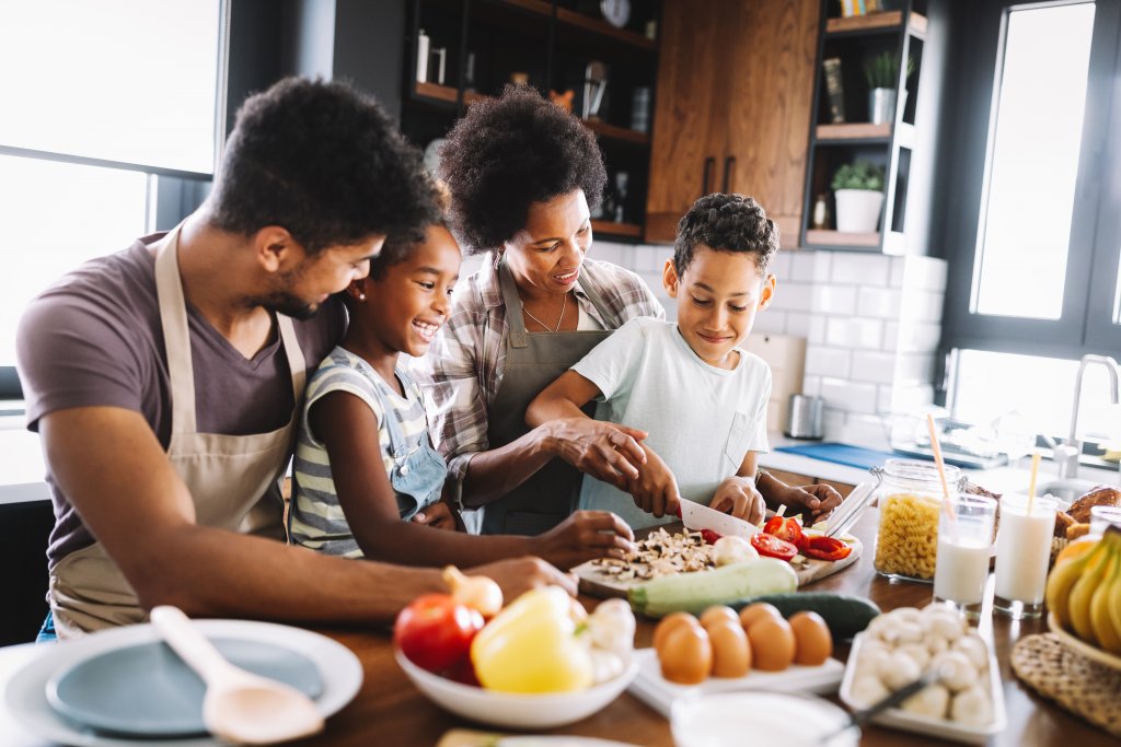 family preparing food together