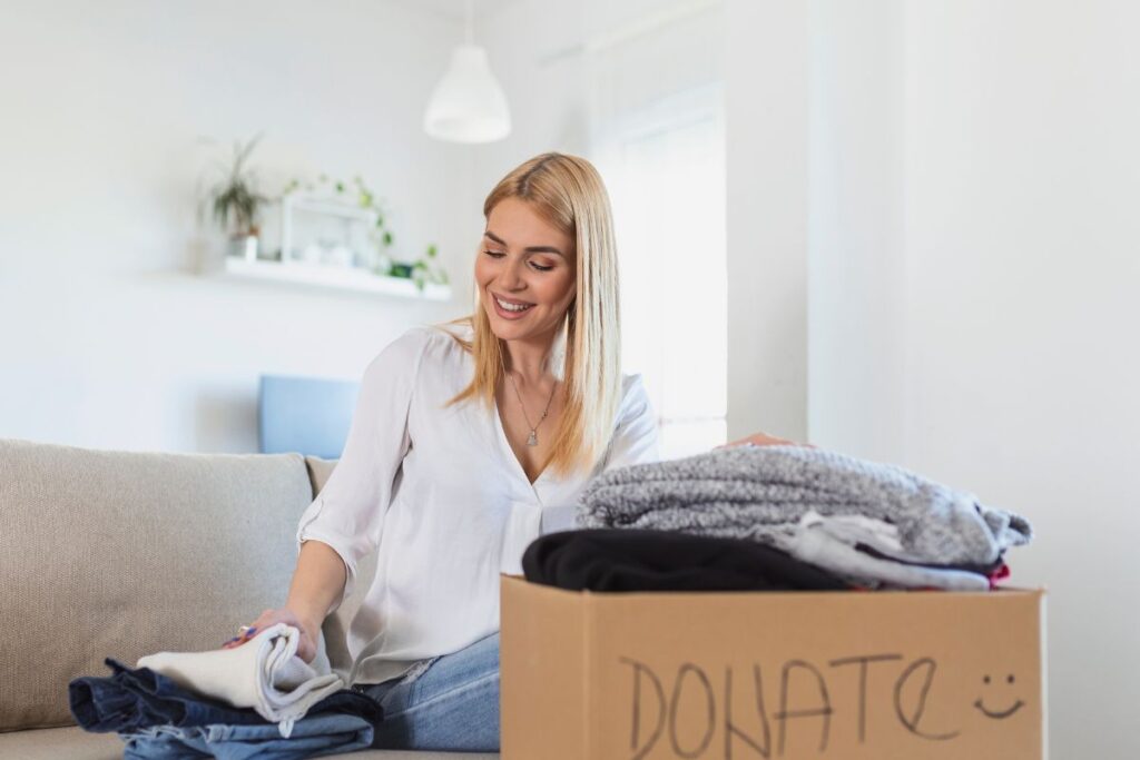 woman decluttering clothing