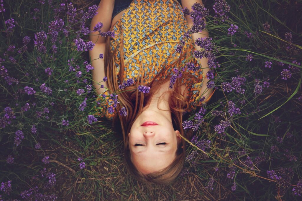 woman laying in lavender field