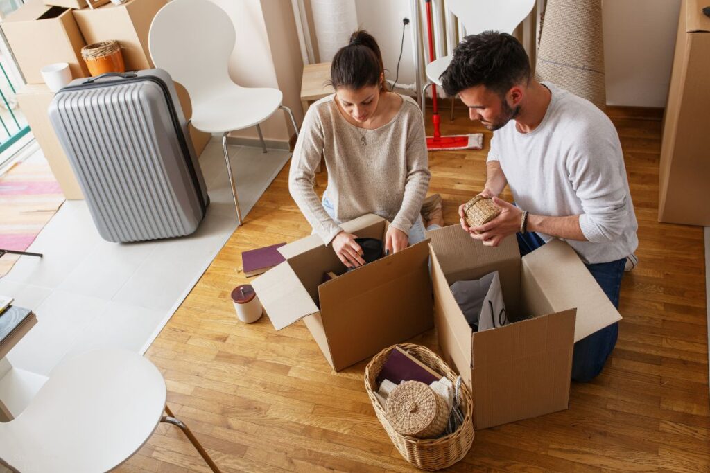 couple boxing up the things they own