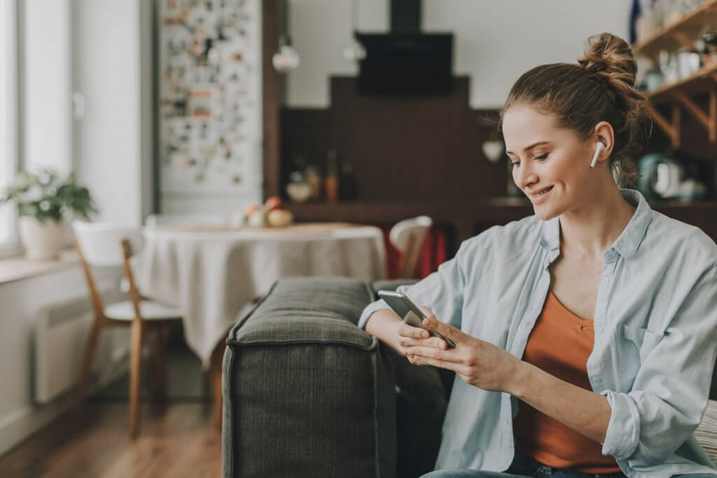woman listening to podcast
