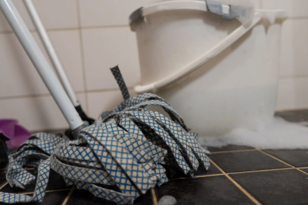 mops and bucket in the bathroom