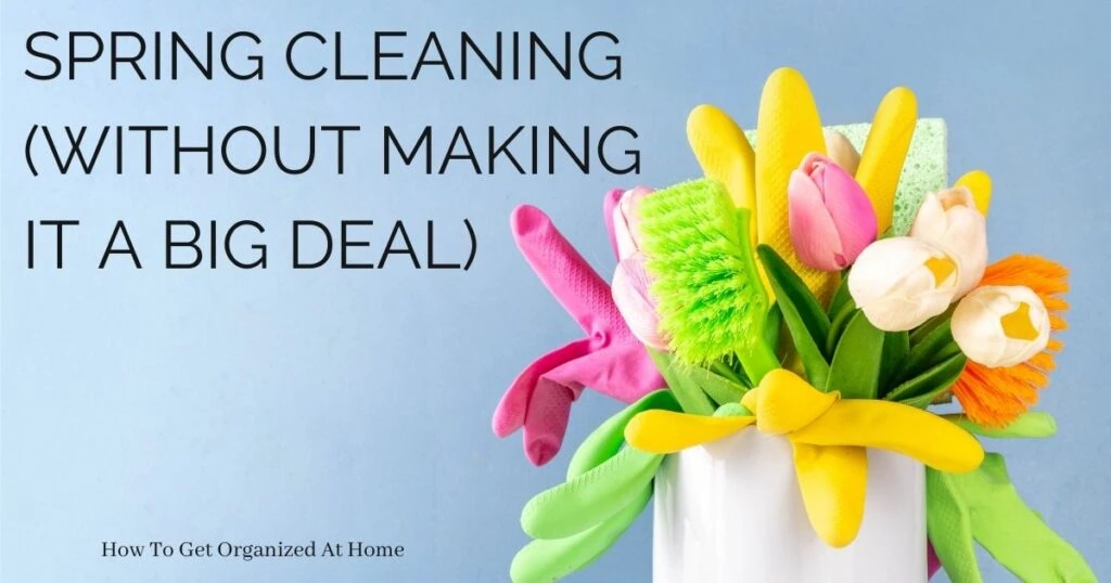 The words 'Spring Cleaning (Without Making It a Big Deal)' are top left. Bottom right is an image of a bucket of cleaning supplies and a couple of flowers positioned like a bouquet of flowers.
